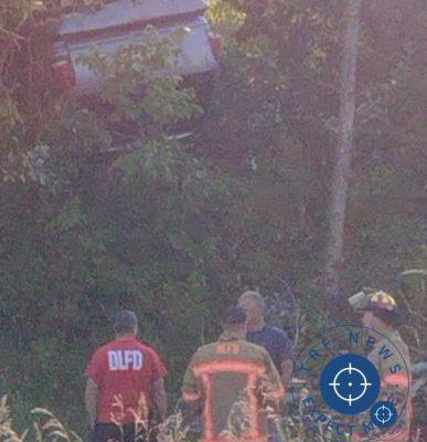 Rollover Into Woods At Detroit Lakes