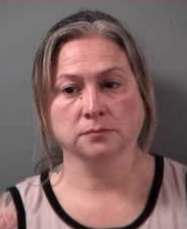 Mugshot of Erika Flores Perez, charged with drug conspiracy and child endangerment in Grand Forks County, North Dakota