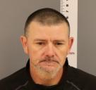 Booking mugshot of Aaron Michael Lewis
