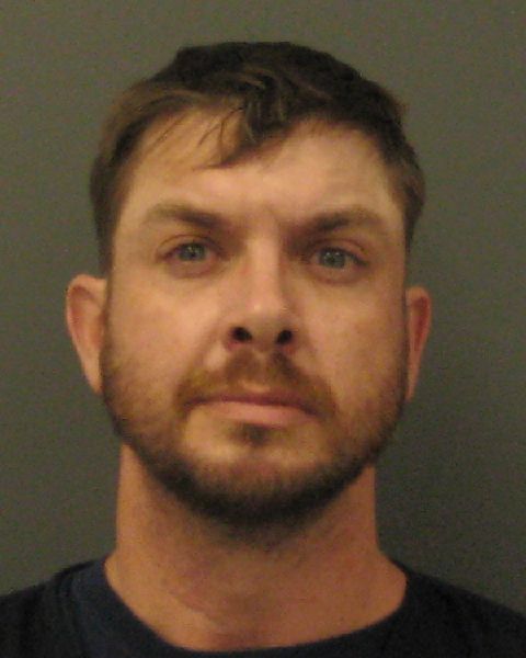 Mugshot of Adam John Kozojed